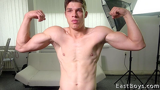 Moaning with Pleasure: Daniel Sucks His Oiled Muscular Chest – EastBoys 18+
