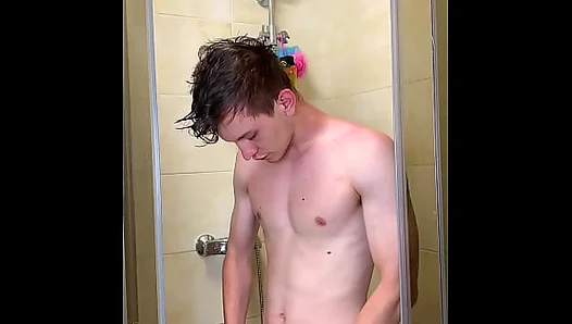 Slender Teen Soaks Under Steamy Spray, Flashing His Juicy Uncut Dick –
